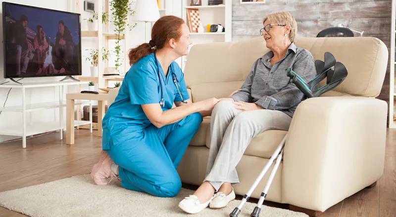 In-home care professional helping senior with medication in Pinellas County
